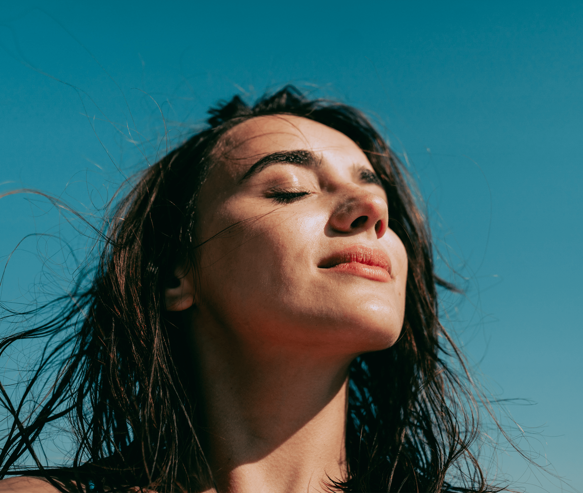 sun shining on woman's face
