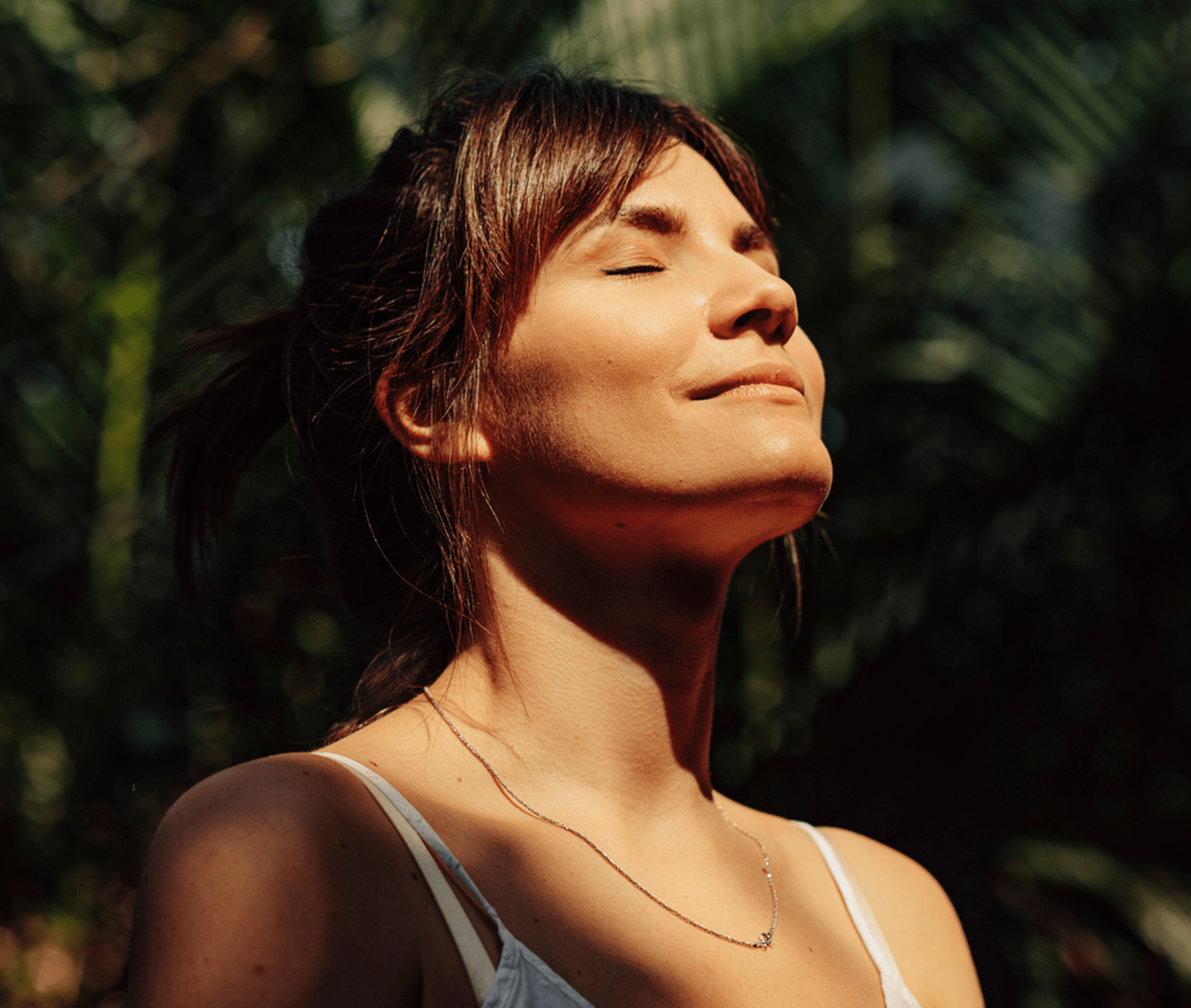 sun shining on woman's face