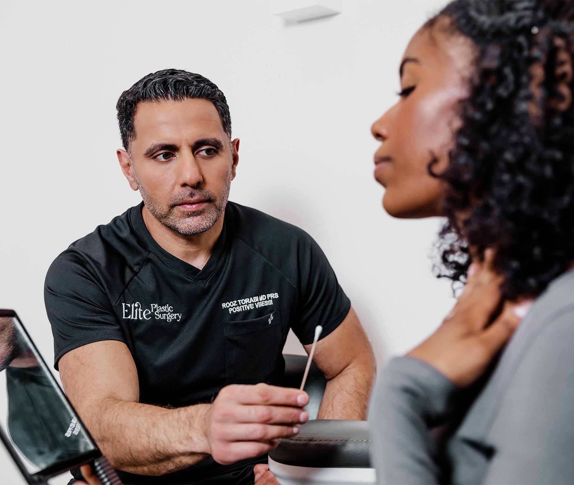 doctor examining a patient