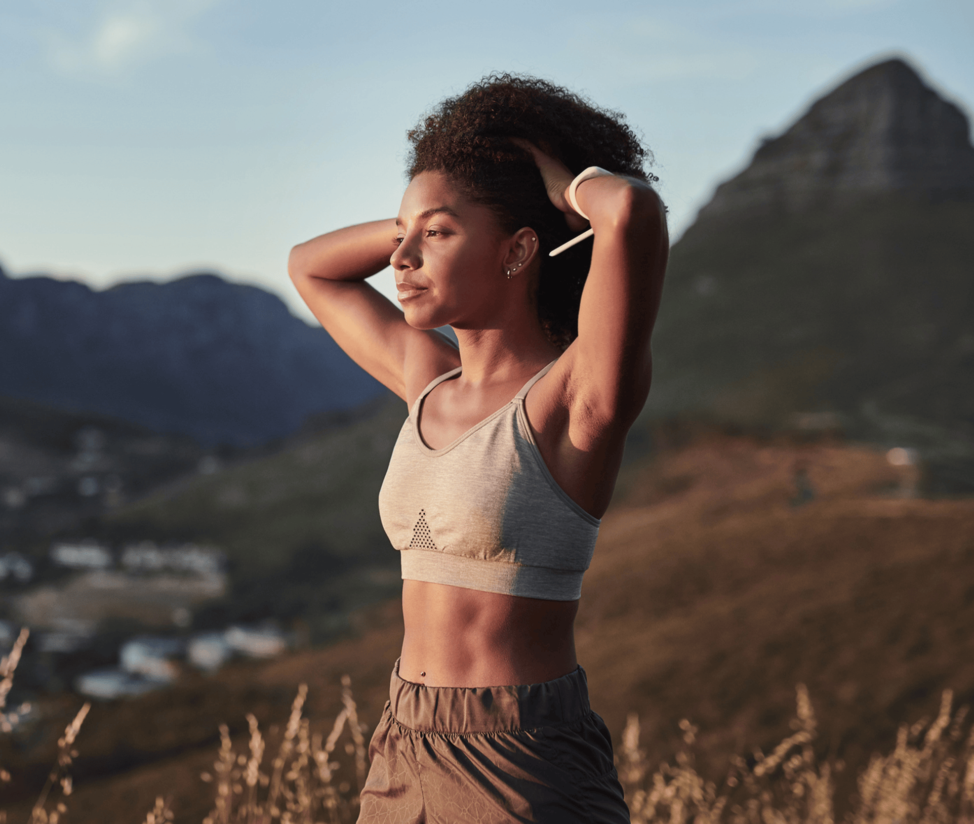 woman holding up her hair