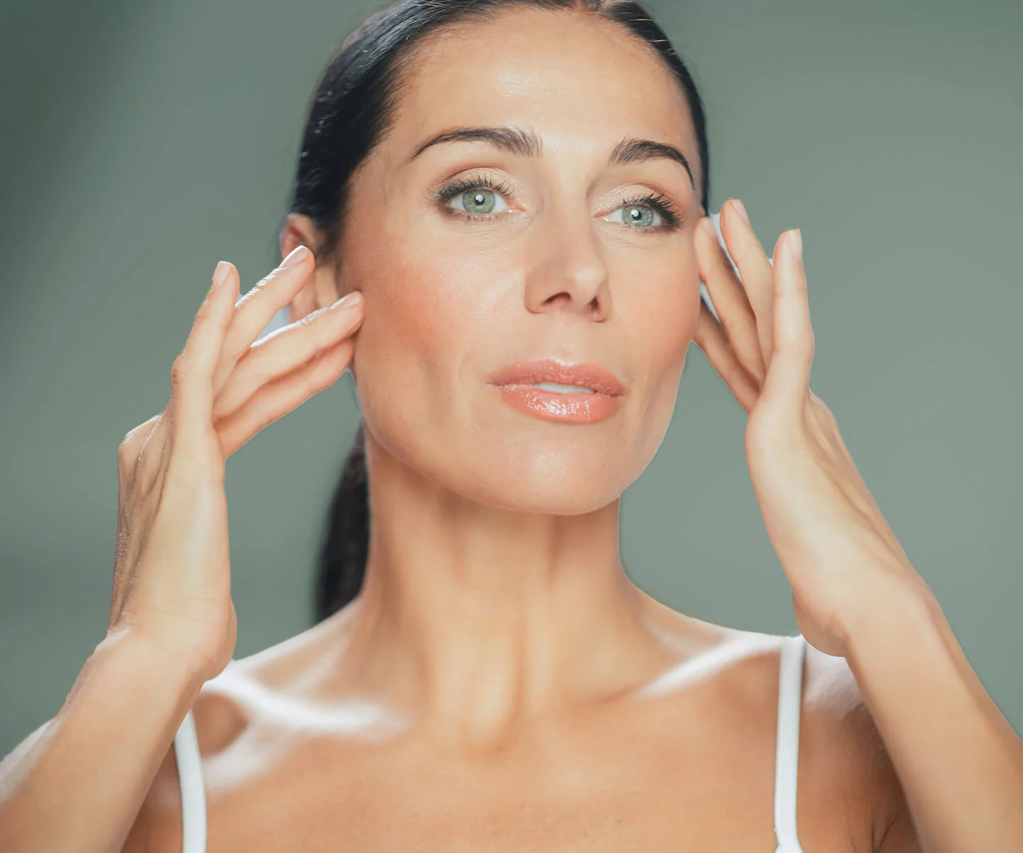 A professional, medical-style close-up of a person's eye area. The eye is open and clear, with the focus on the eyelids and the smoothness of the skin. The lighting is bright and clinical yet gentle, providing a clear view of the ocular anatomy against a soft, neutral grey background. - Chalizion incision and drainage in Arizona